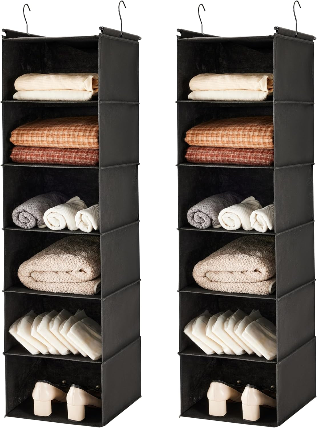 Two dark-gray hanging organizers shown side by side, packed with rolled towels and folded linens