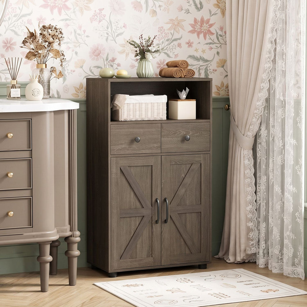 Dark wood cabinet styled in a floral room, with an open shelf, two drawers, and two lower doors.