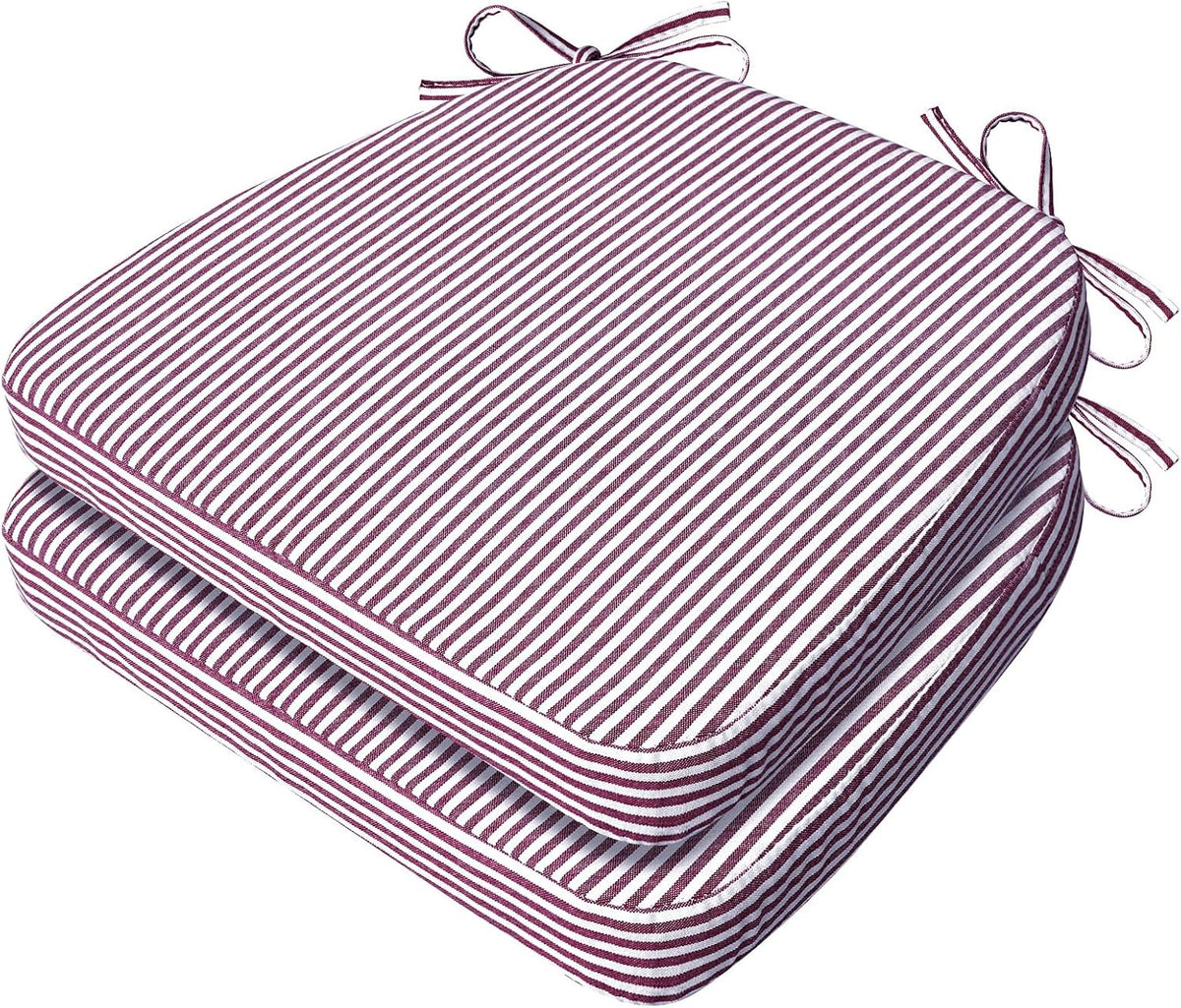 Two red-and-white narrow-striped D-shaped seat cushions stacked, stripes running diagonally across the top.