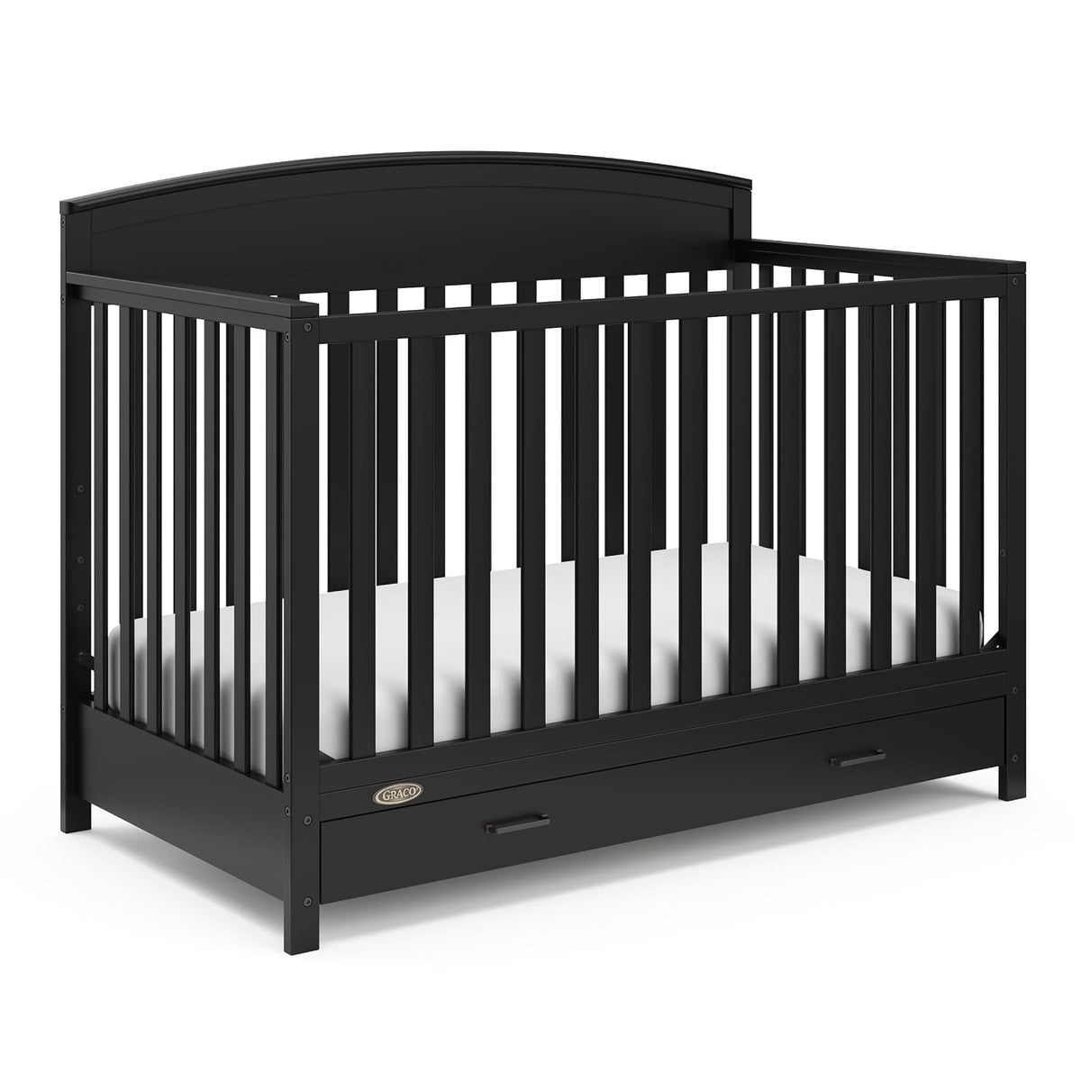 Three-quarter view of a black convertible crib with slatted sides and a lower storage drawer