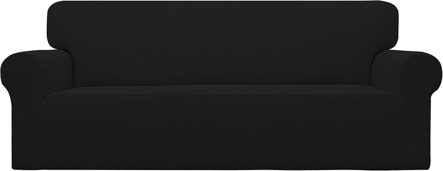 Straight-front shot of a black stretch slipcover showing rounded arms and a clean fitted skirt.