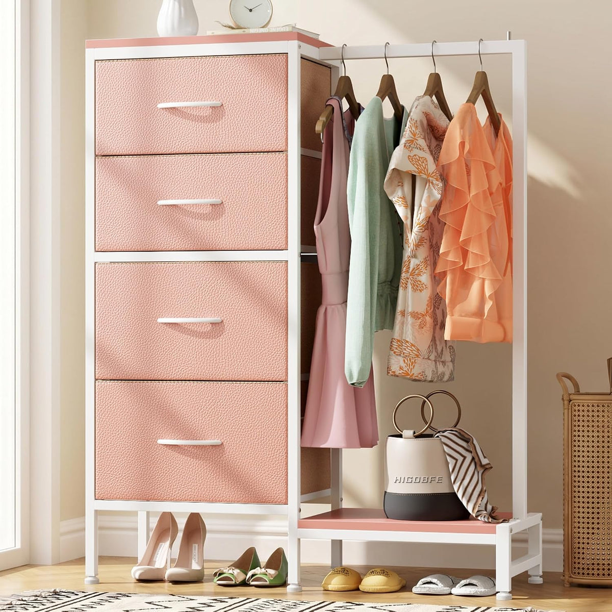 Close view of a blush-pink dresser column with hang rod and shoes and bag on the lower shelf