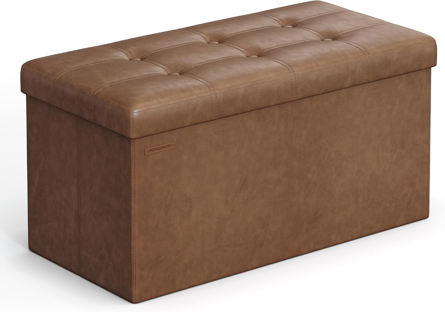 Light tan faux-leather storage bench with stitched tufted cushion shown at a slight angle on white.
