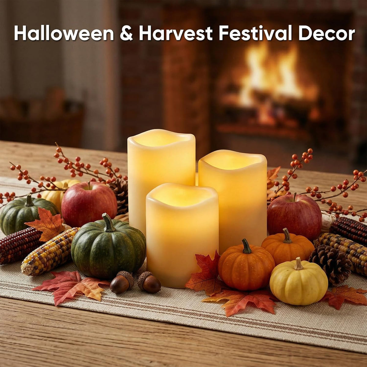 Three lit ivory resin pillar candles styled with pumpkins and autumn decor on a wooden tabletop for fall display