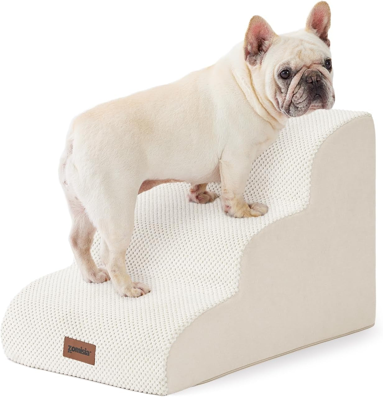 Cream-colored three-step foam pet stairs with textured cover and a small dog standing on top step