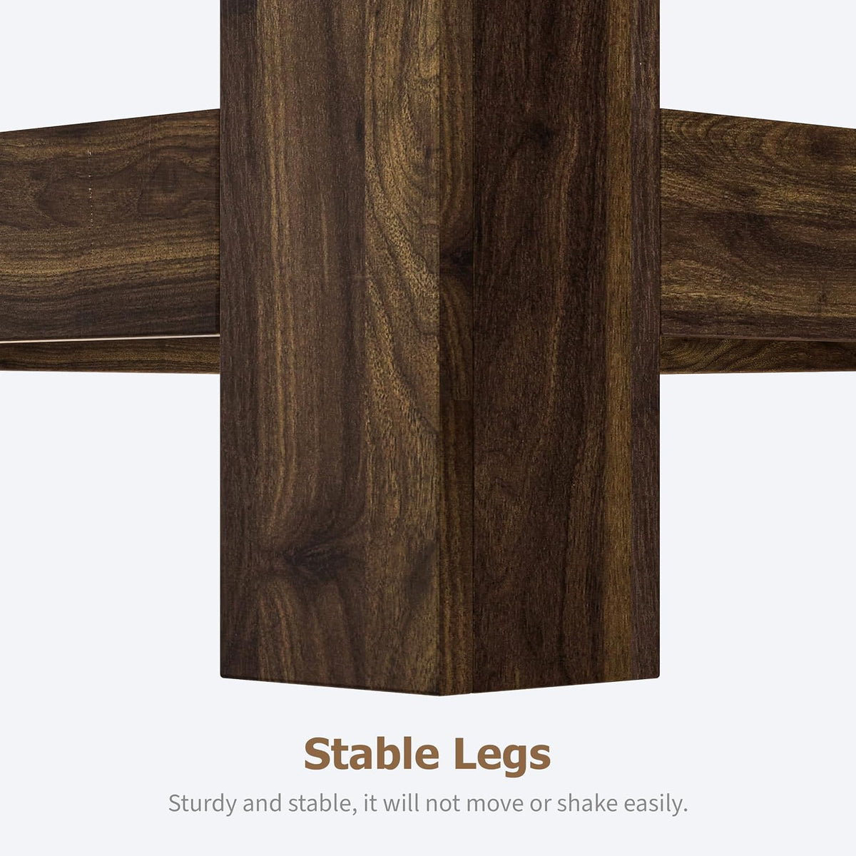 Tight crop of a single square leg and adjacent lower shelf showing wood-grain melamine surface