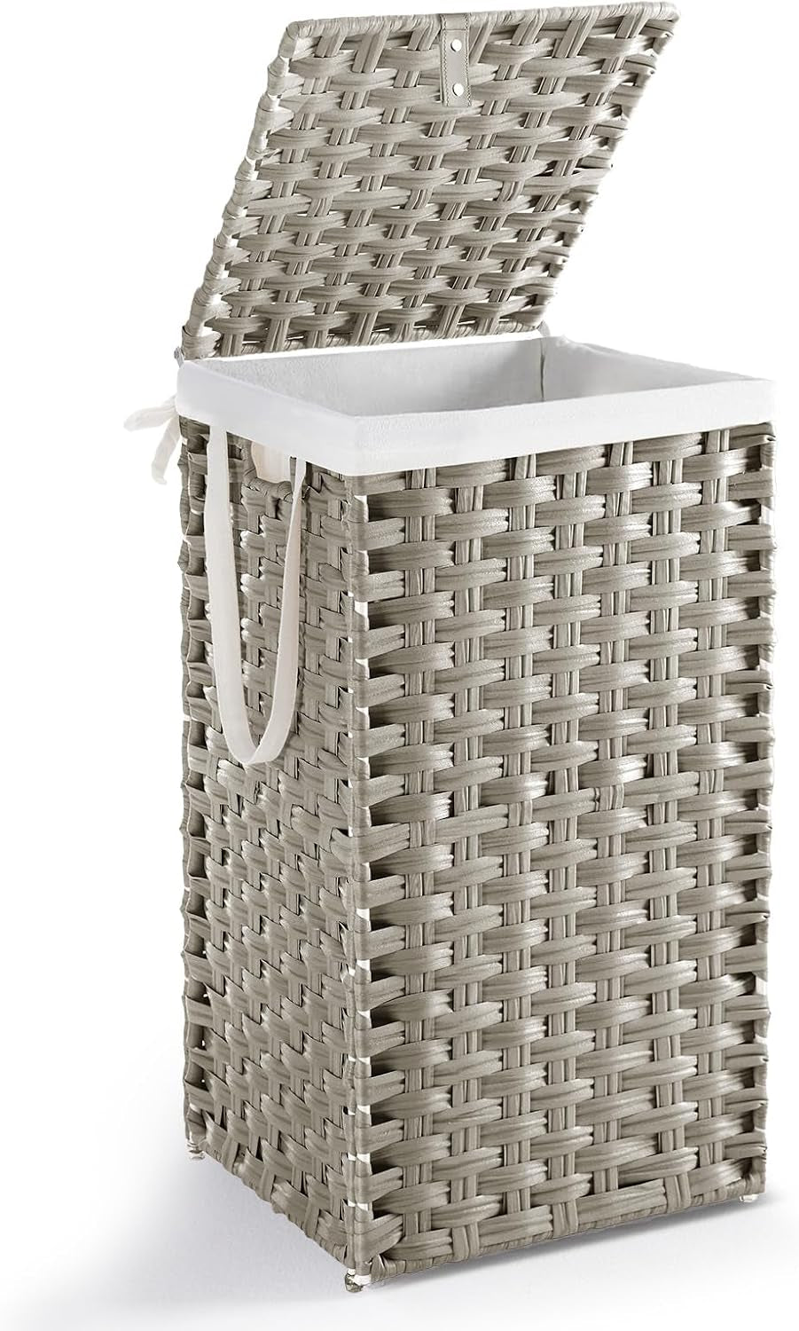 Three-quarter side profile of the gray rattan hamper showing weave texture, side handles and open lid.