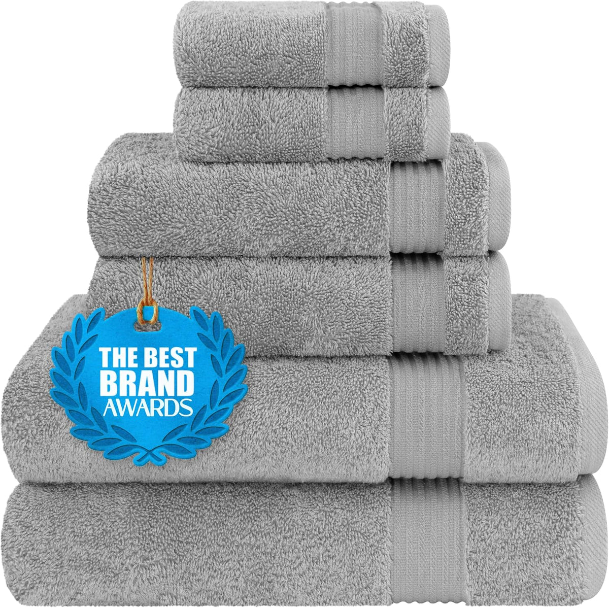 Neatly stacked gray towels shown from the front with ribbed bands and dense terry loops.