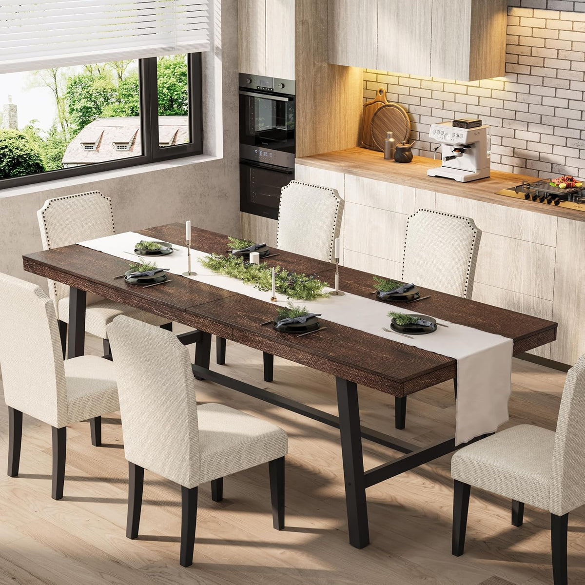 Same dining setup with the table in a darker wood finish, black metal base and upholstered chairs