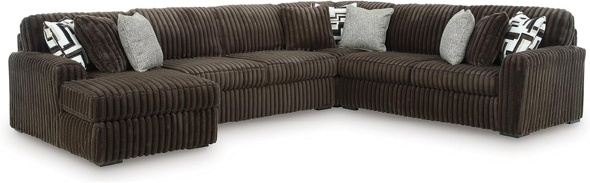 Wide three-piece oversized sectional in chocolate brown jumbo corduroy with accent pillows