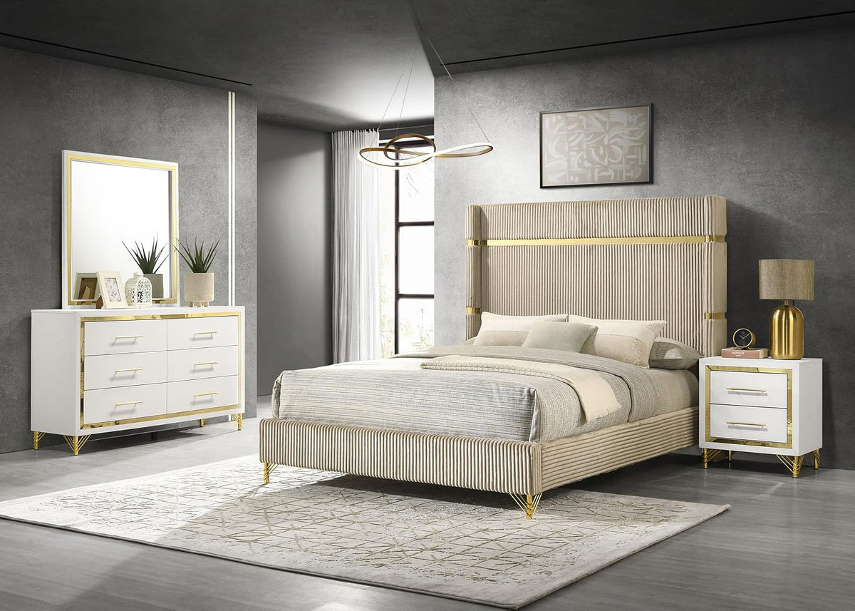 Beige velvet wingback bed staged with white six-drawer dresser and matching two-drawer nightstand with gold accents