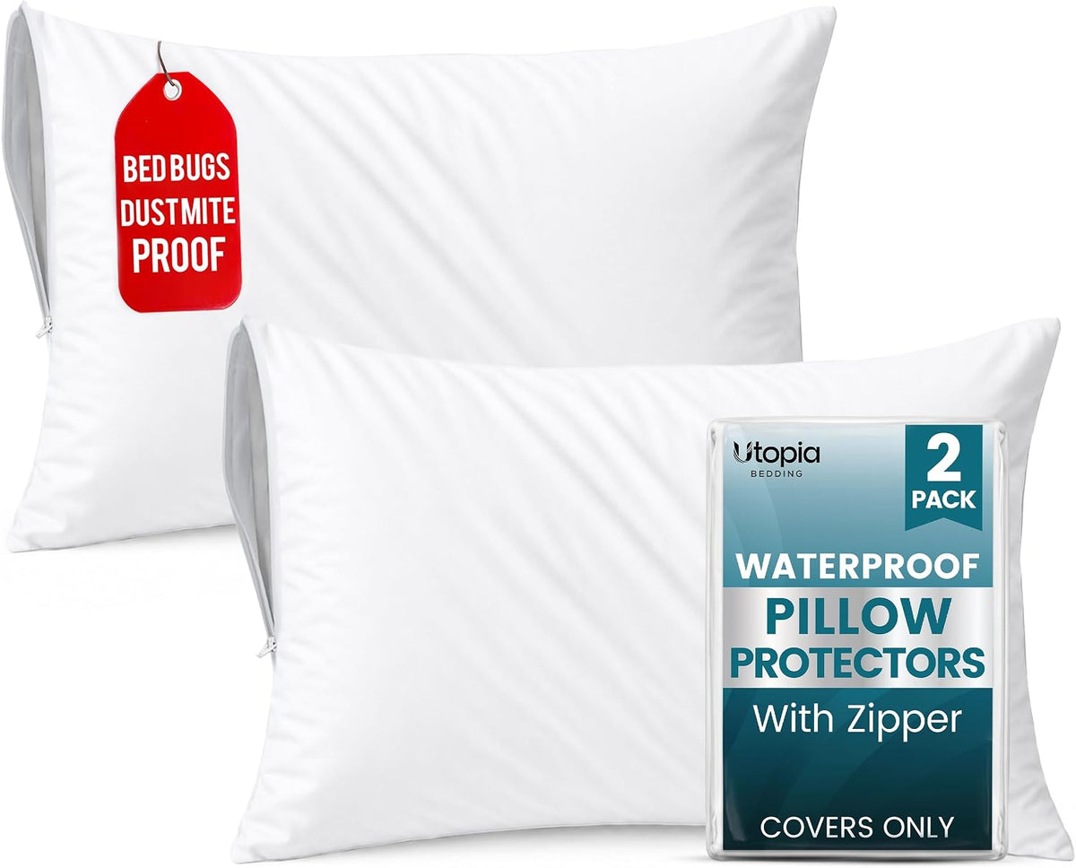 Two white zippered pillow covers with packaged insert shown at lower right and a red tag on the back pillow.