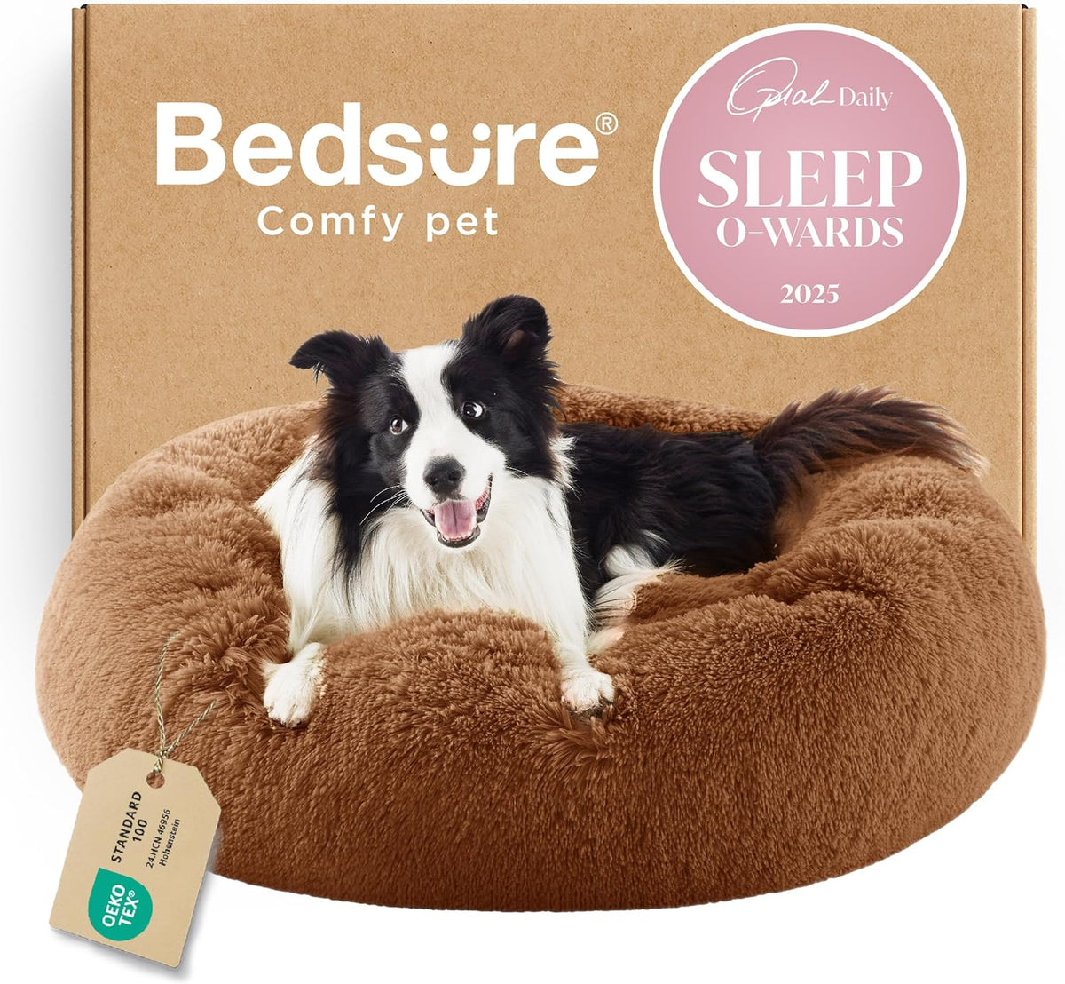 Brown round faux-fur donut bed with a black-and-white border collie lounging against a brown cardboard box.