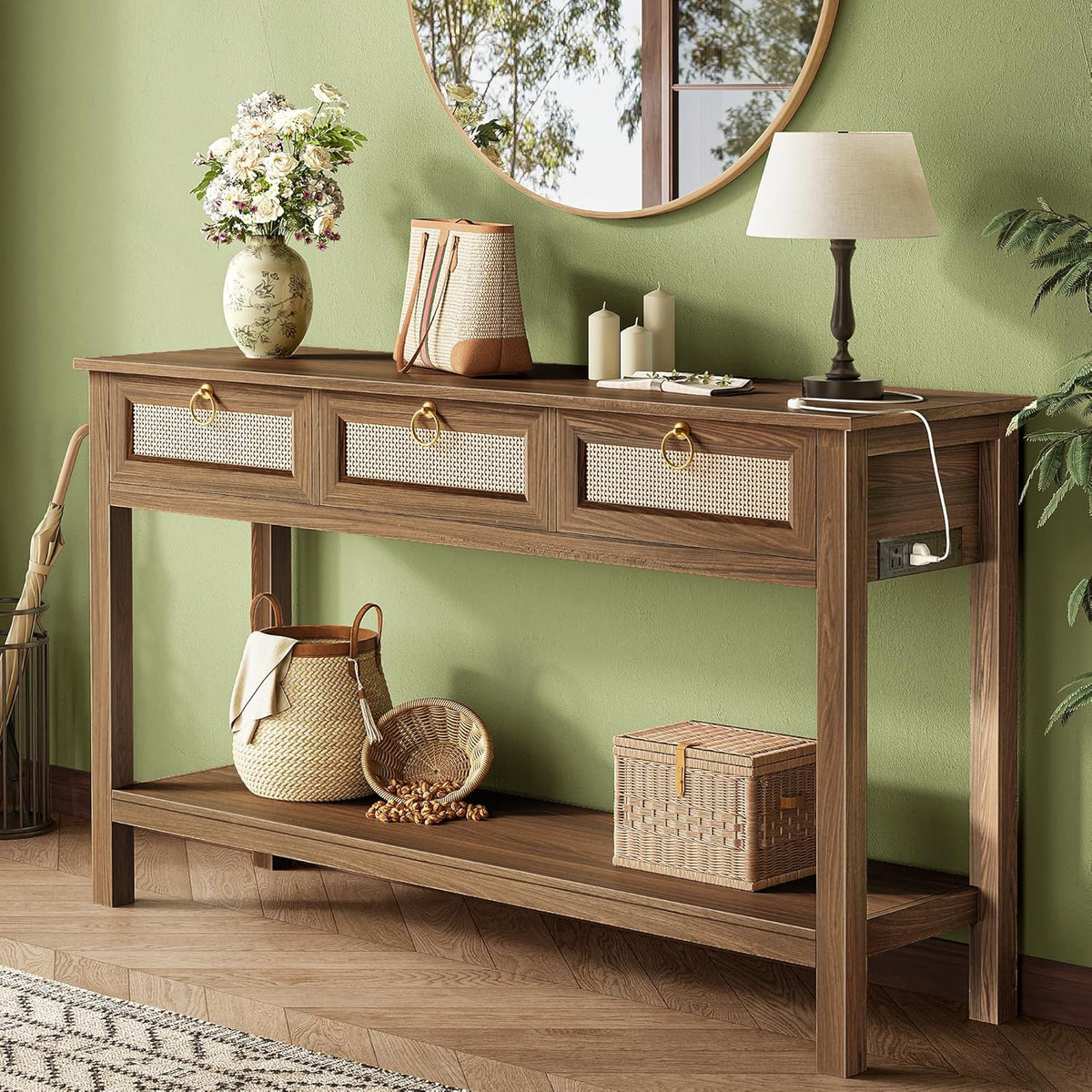 Medium oak console table front view with umbrella at left, woven baskets on shelf and a lamp on top