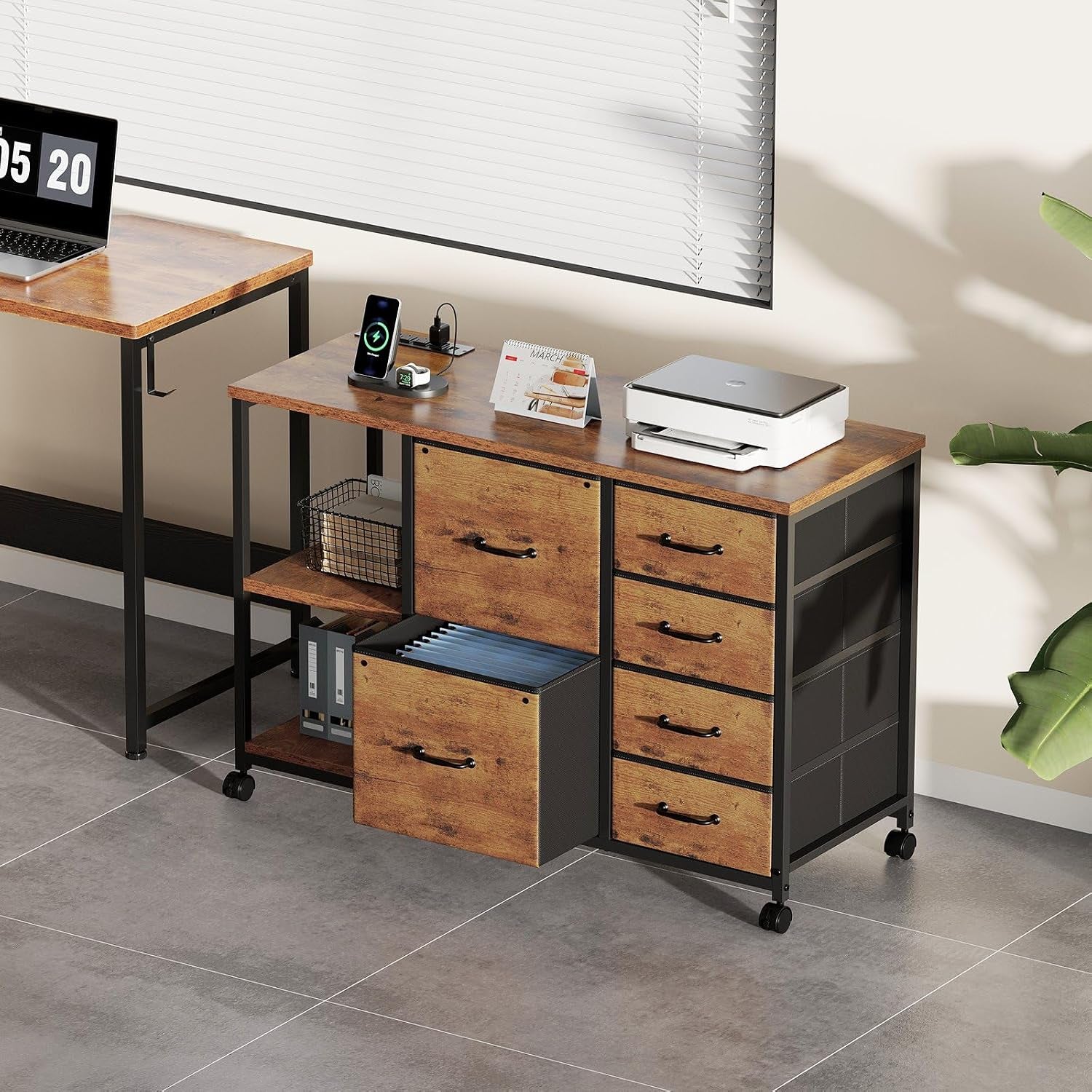 Brown rolling file cabinet beside a desk with a printer on top and an open drawer showing hanging file folders