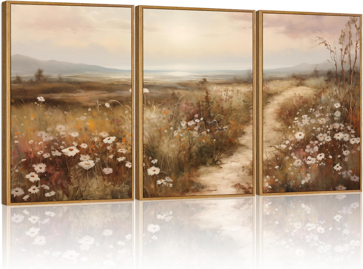 Triptych framed landscape painting of a sunlit meadow path with wildflowers in soft brown and cream tones.