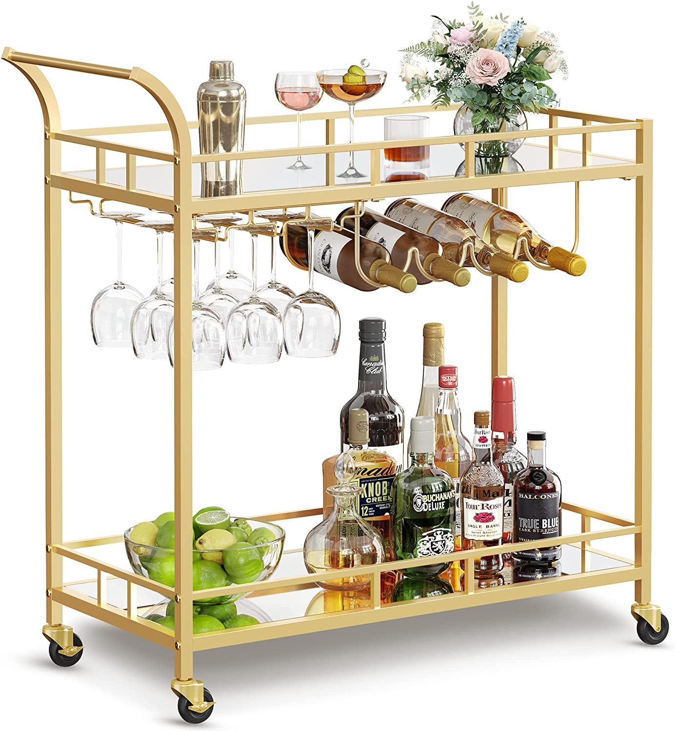 Gold metal bar cart with two mirrored shelves, hanging wine-glass rack and four caster wheels.