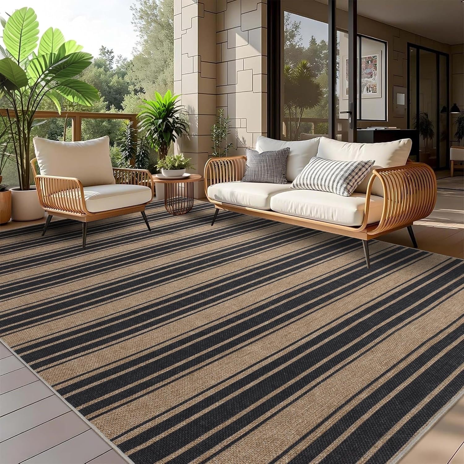 Tan and black striped rug on a covered patio under seating with potted plants, wide-angle view