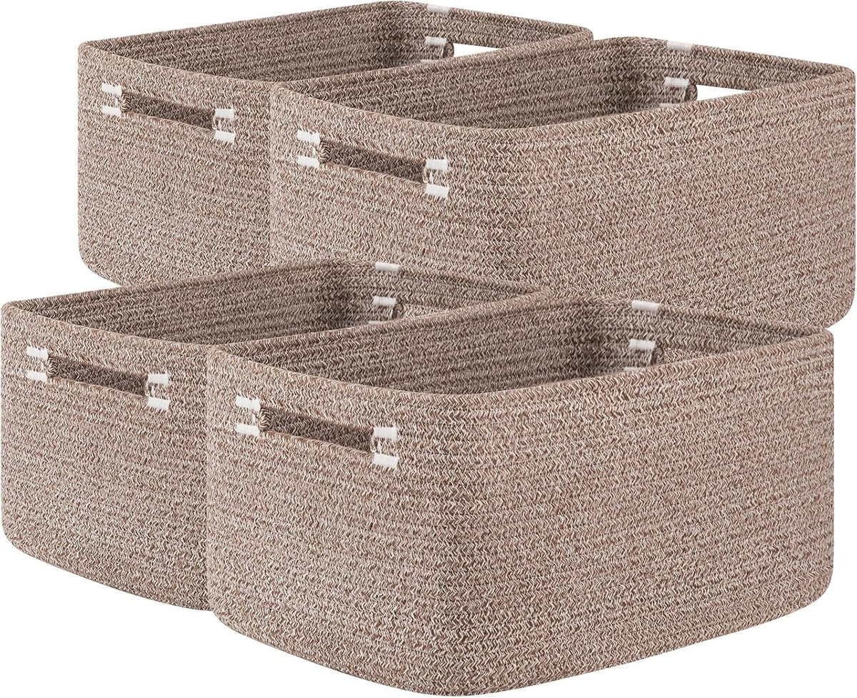 Four brown woven rope baskets staggered together, showing rectangular shape and cutout handles.