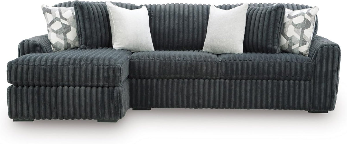 Gray jumbo-corduroy oversized chaise sectional with left chaise and light accent pillows