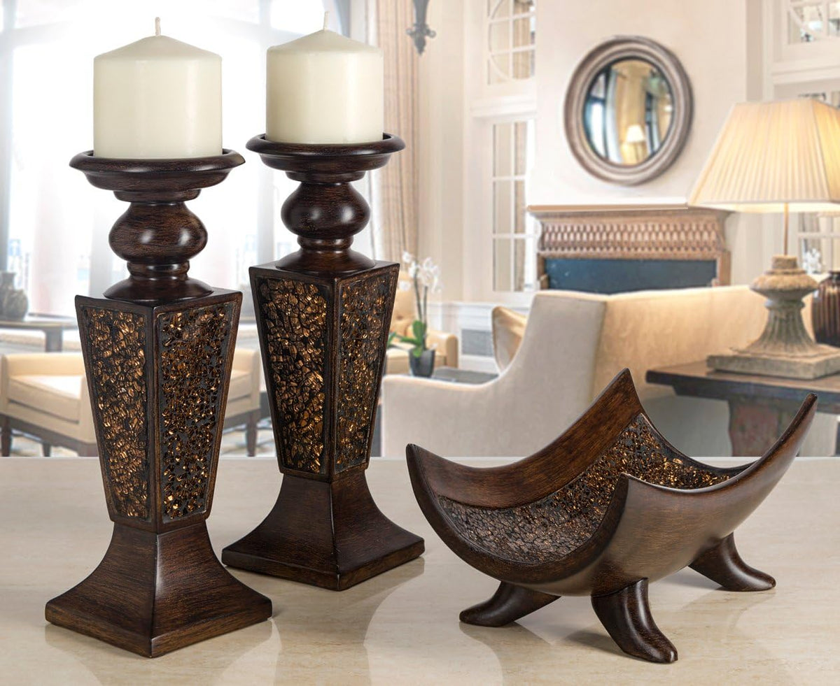 Pair of brown crackled mosaic candle holders styled on a table with decorative wooden bowls and living room backdrop