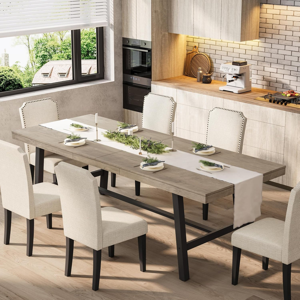Close angled view of the extendable table showing seam at the butterfly leaf and sturdy black metal legs.
