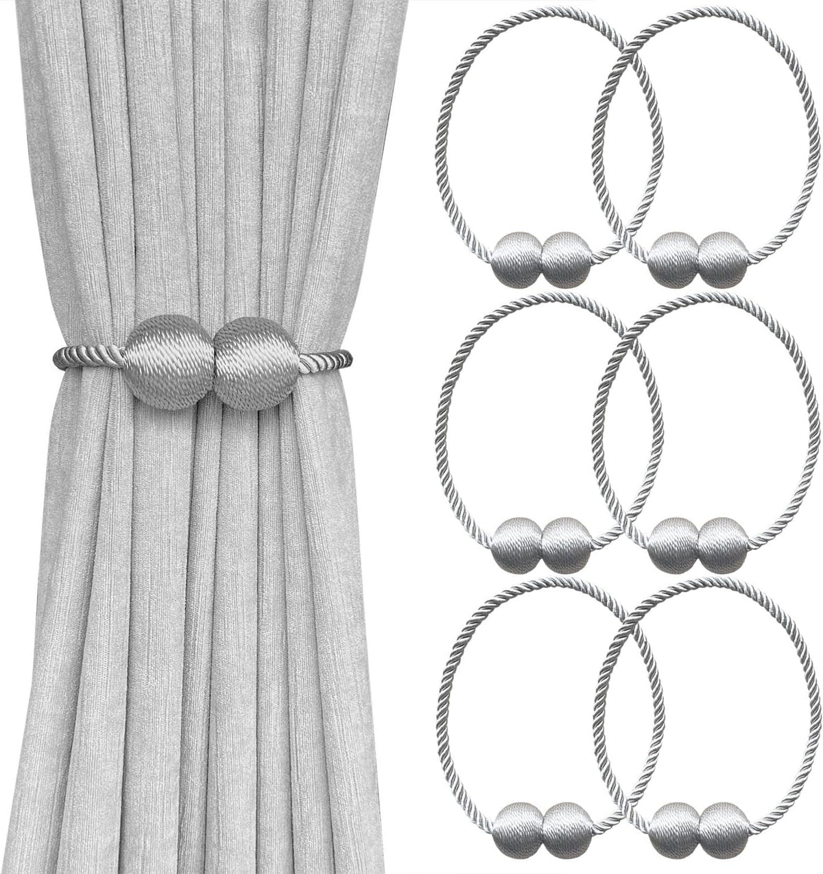 Gray curtain secured with a silver-gray twisted rope tieback featuring two round textured balls.