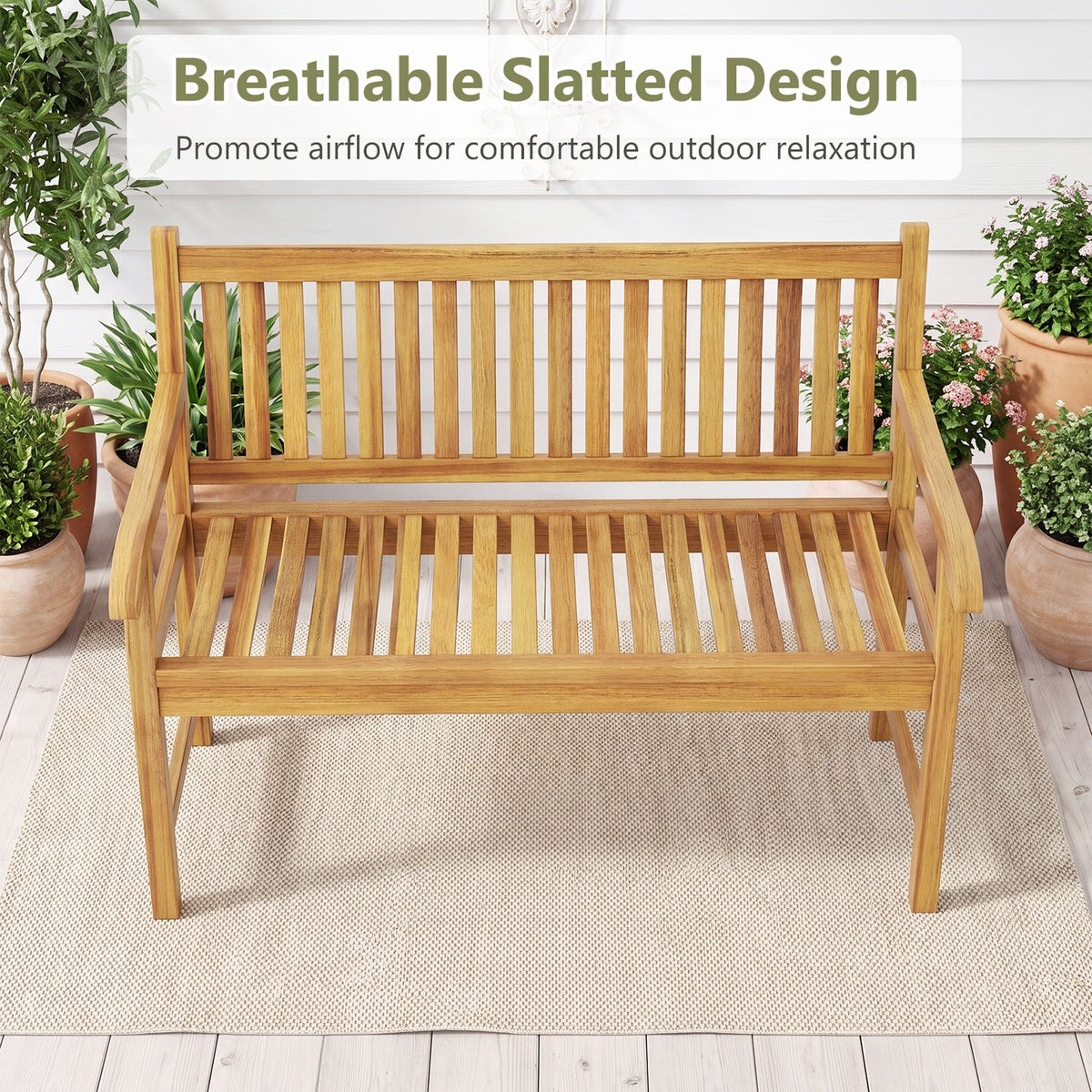 Front view of a wooden garden bench with closely spaced vertical back slats and a slatted seat.