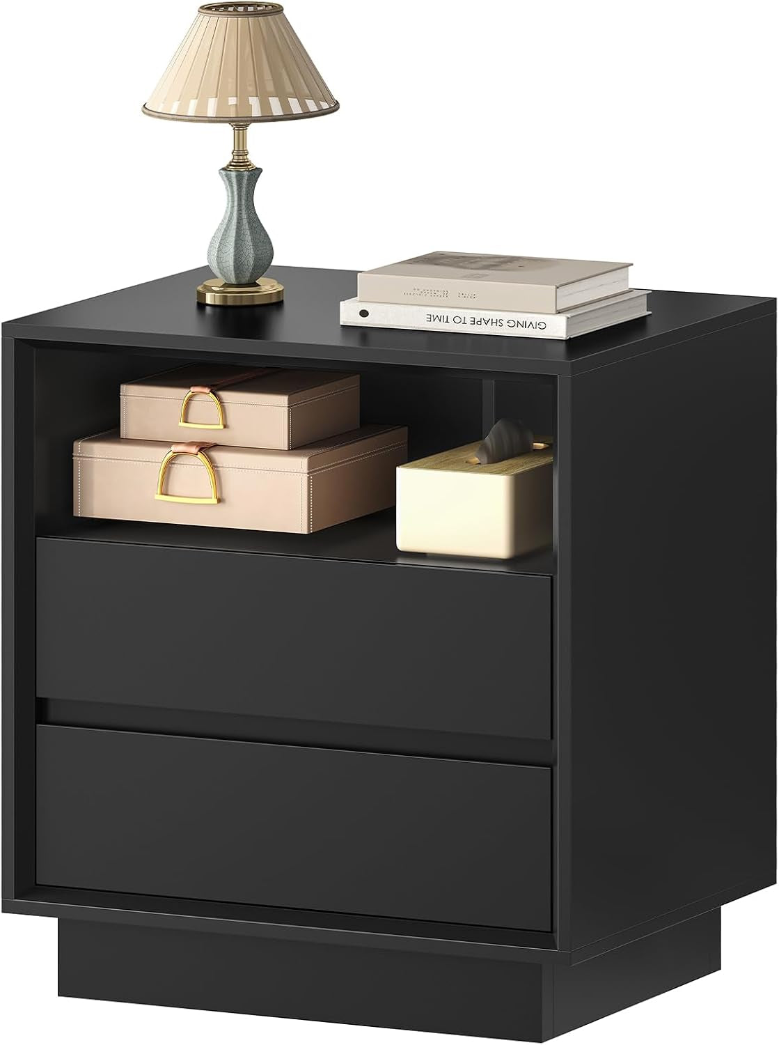Black nightstand showing an open cubby above two drawers, lamp and boxes on top and inside shelf.