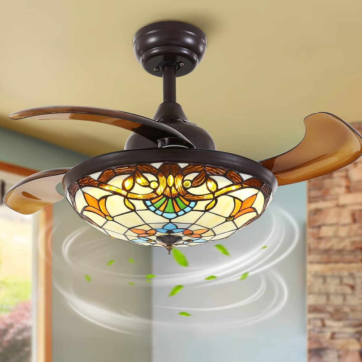 Close-up low-angle shot of the fan spinning with stylized air swirls and green leaves to show airflow.