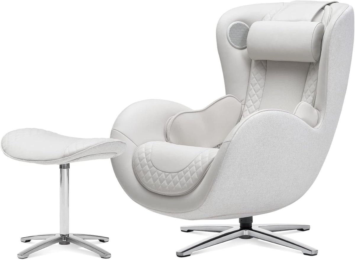 All-white massage recliner with quilted seat details and a white ottoman, both on chrome star bases.