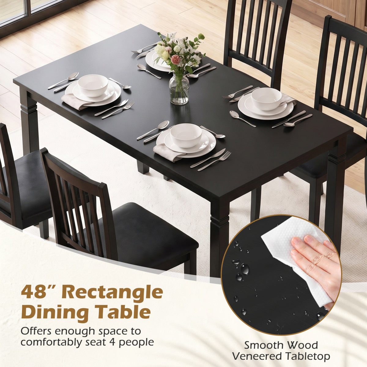 Black rectangular table set with place settings, alongside a close-up of a hand wiping its surface.