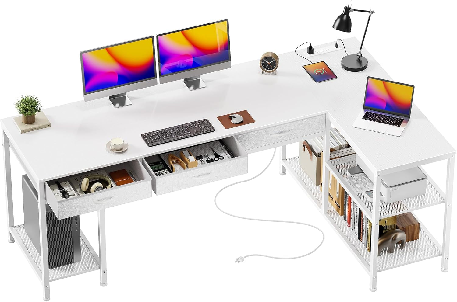 White L-shaped desk from a slight overhead angle showing three fabric drawers open and a desktop with dual monitors.