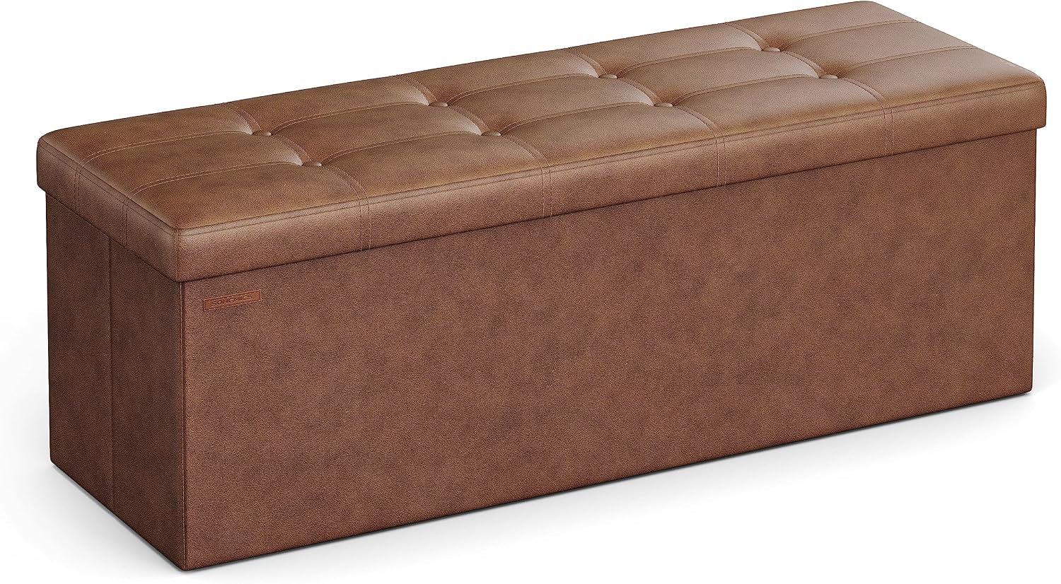 Rectangular brown faux-leather storage ottoman bench with tufted top shown on white background.