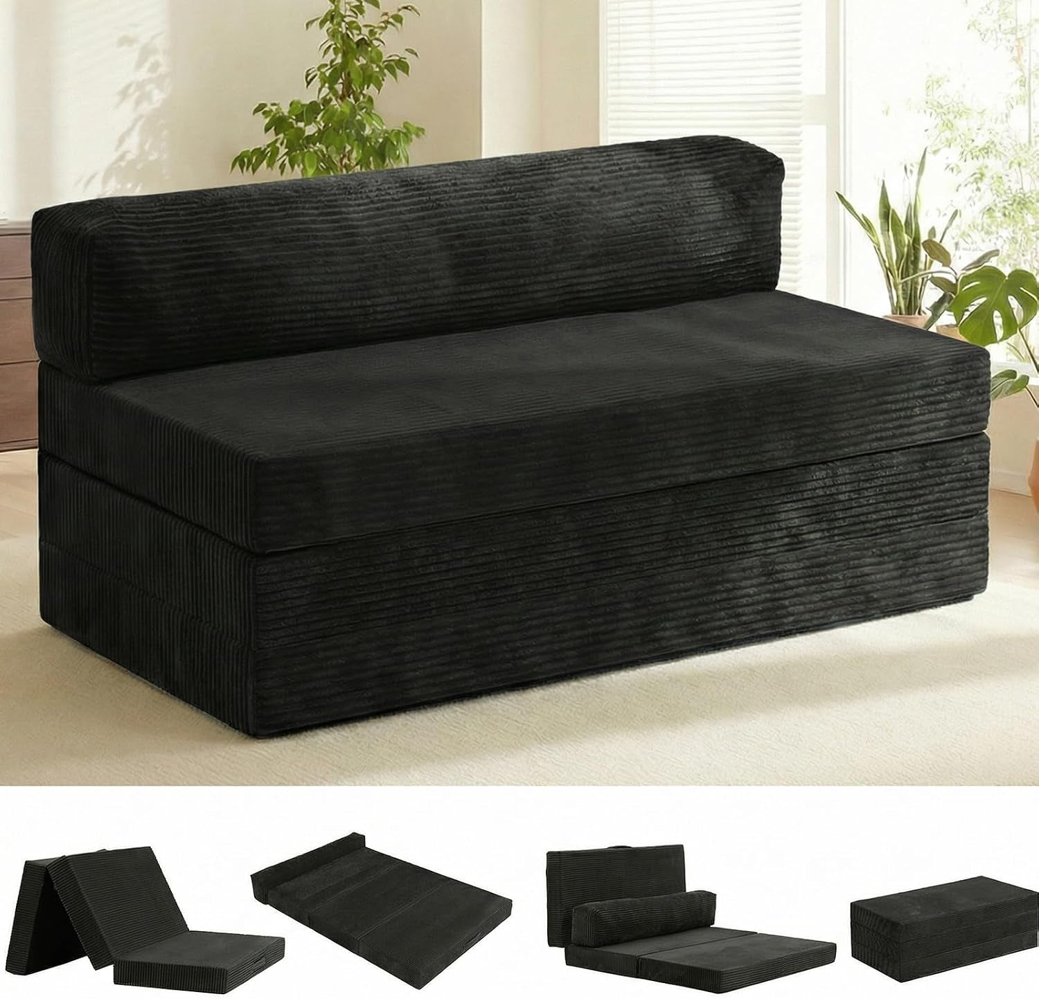 Front view of a black corduroy futon sofa bed shown in a bright living space with plants.