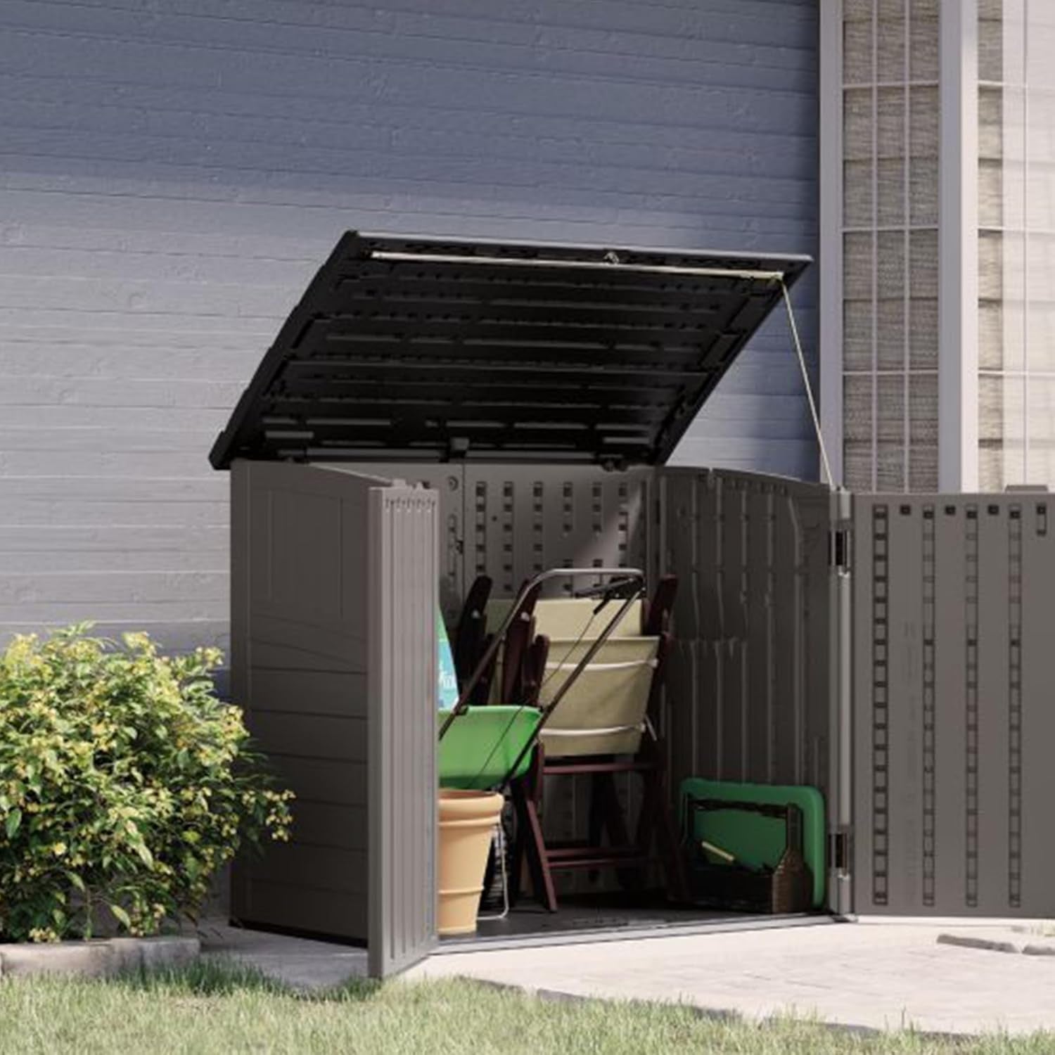 Interior view with hinged lid open showing stacked patio chairs and gardening items stored inside