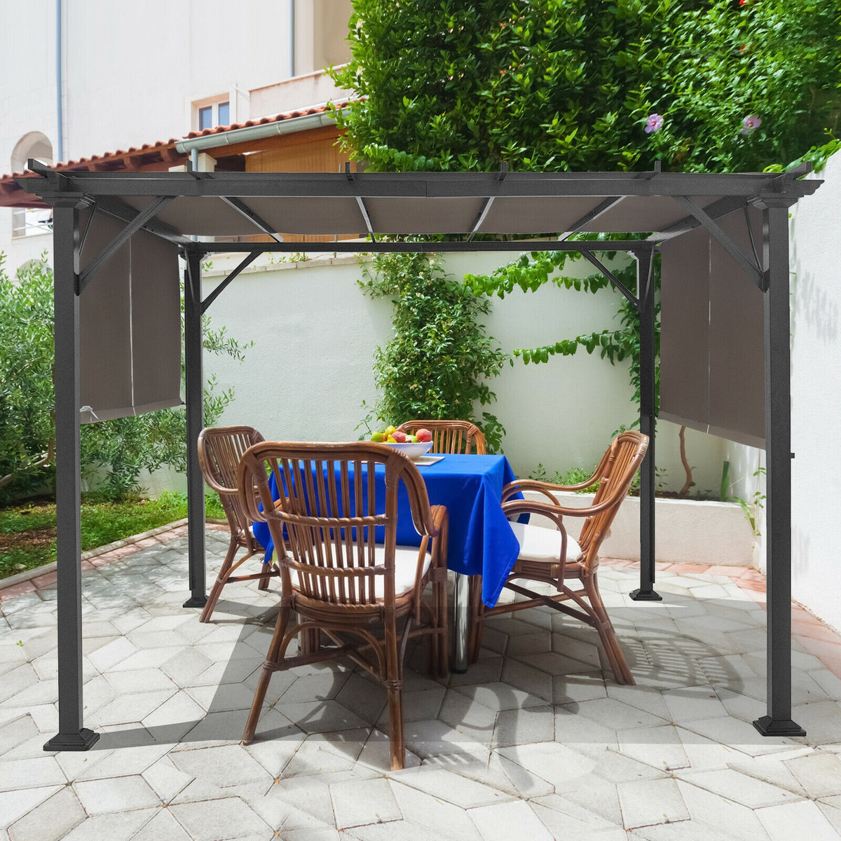 Dark metal gazebo with gray-brown side shades over a patio dining set.