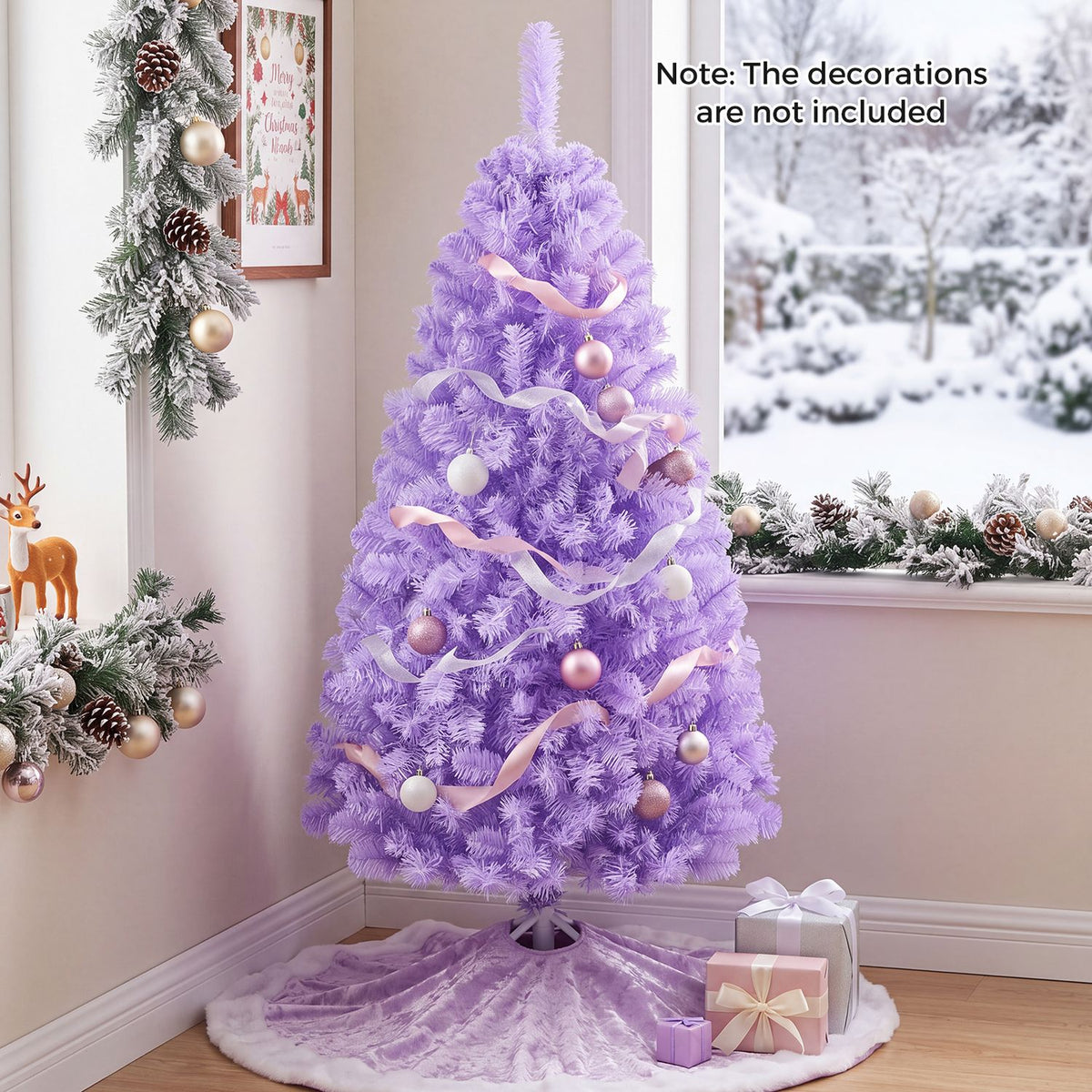 A flocked lavender Christmas tree decorated with pale ornaments and ribbon stands beside a snowy window.