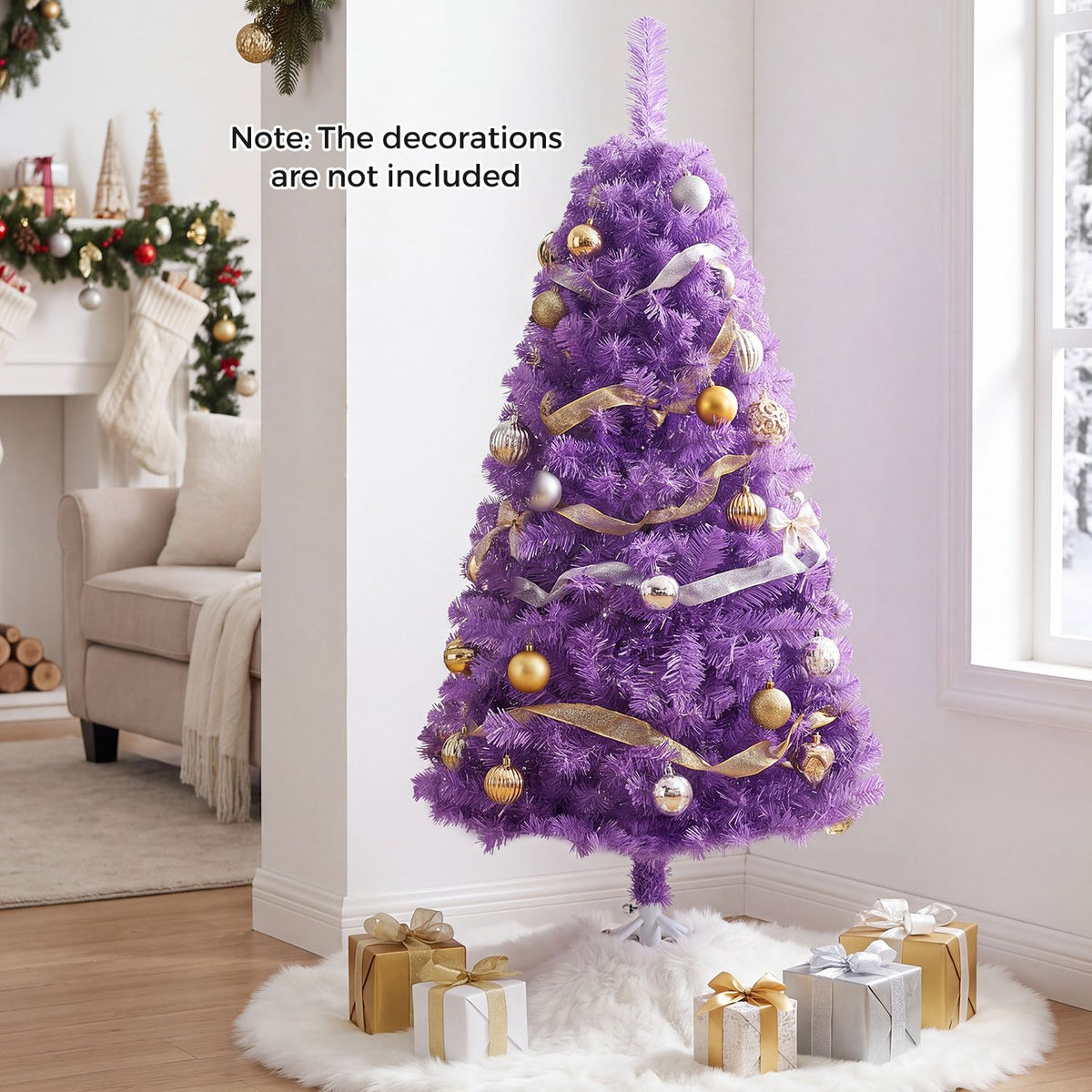A purple Christmas tree with gold and silver ornaments stands on a white tree skirt beside wrapped gifts.