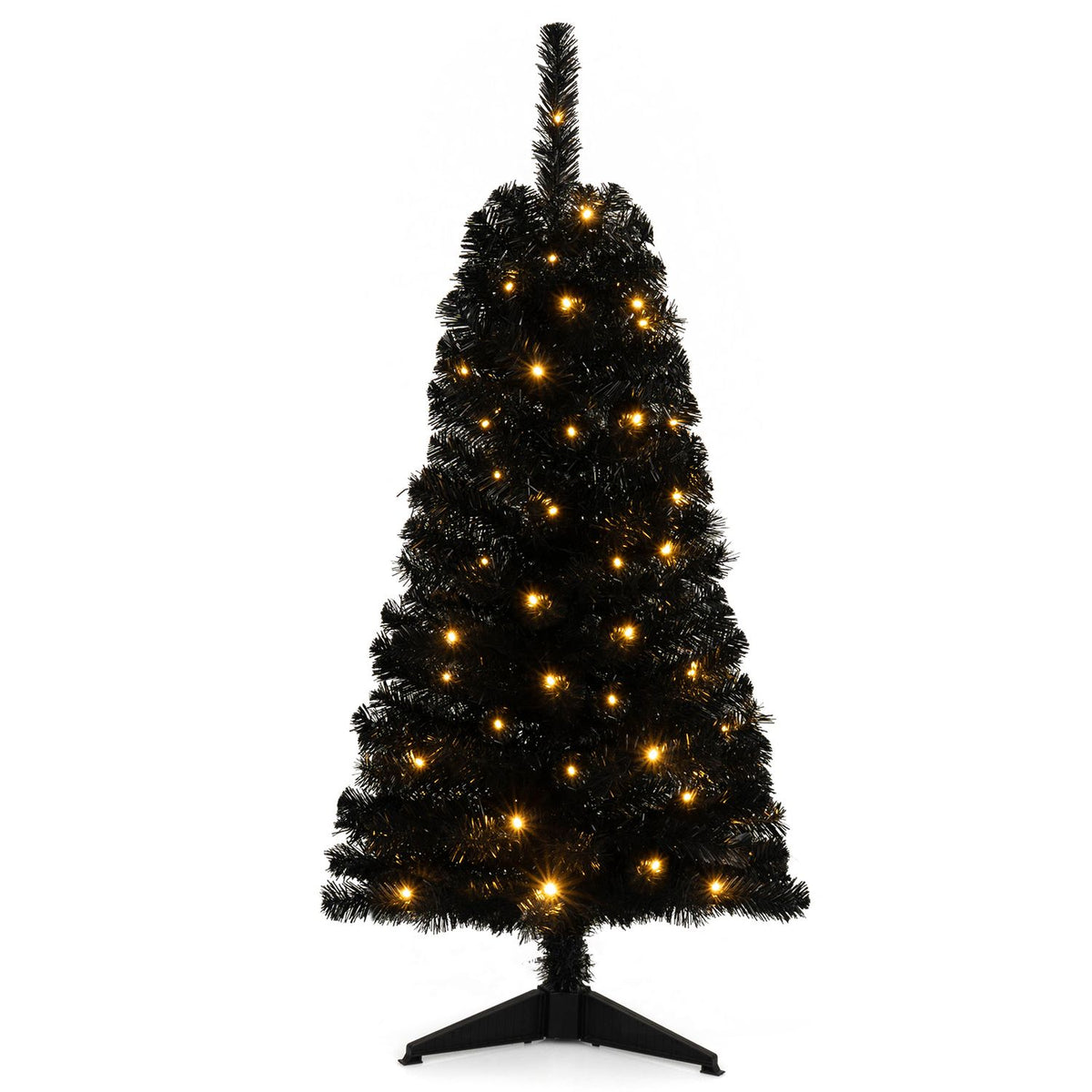 Front view of a lit artificial tree on a black stand against a white background.