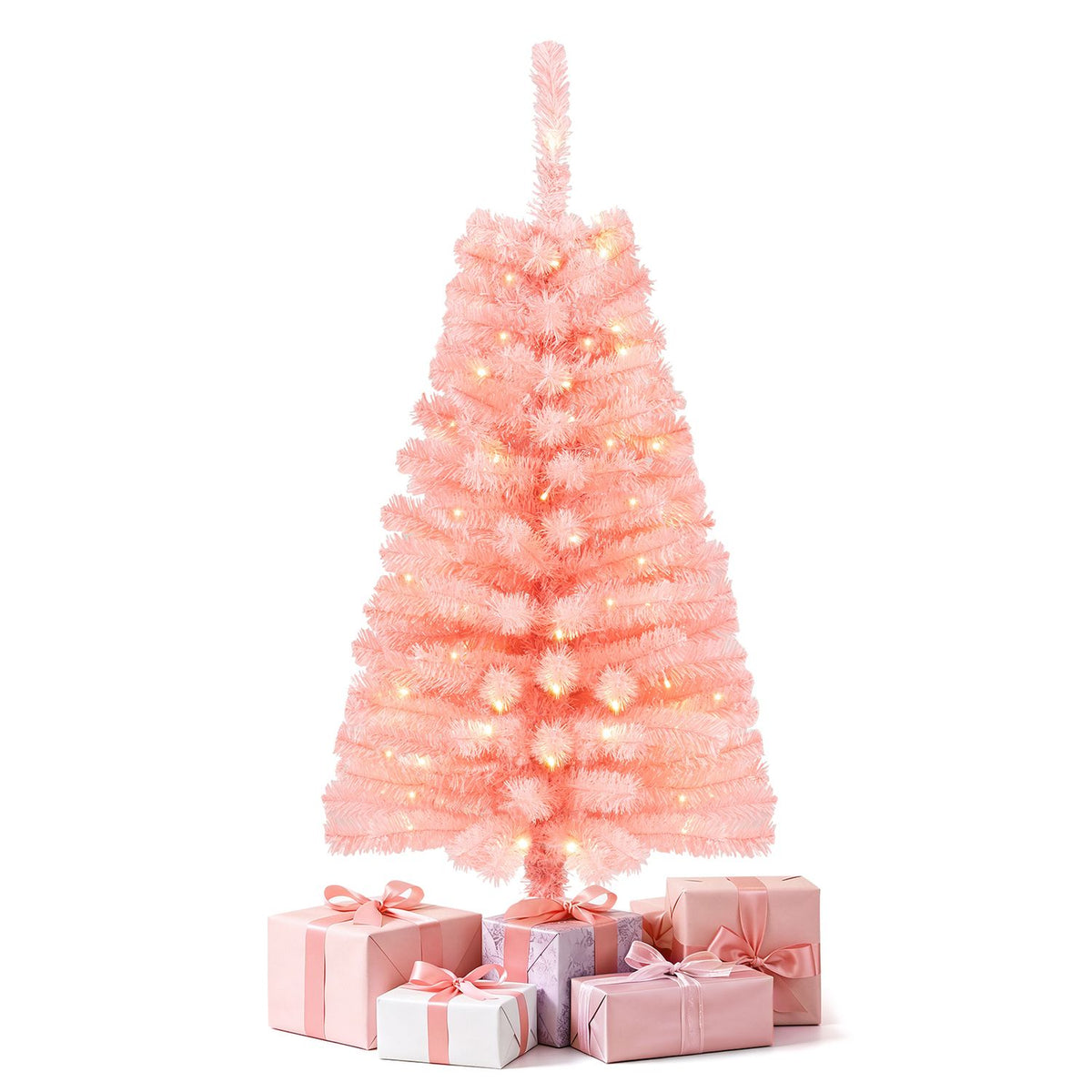 A lit pink Christmas tree stands behind a group of pink and silver wrapped gifts.