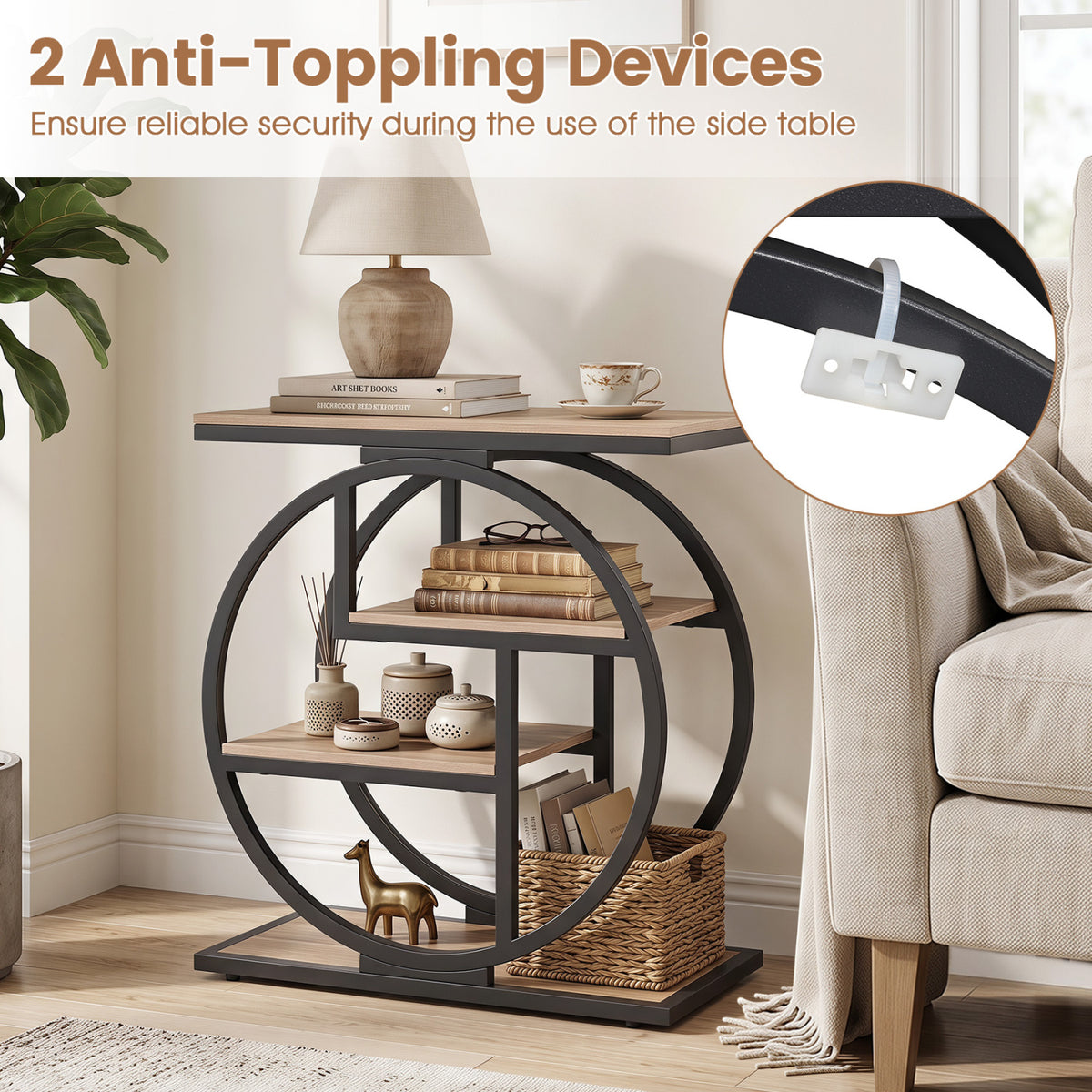 Round black end table with open shelves beside a sofa, with an inset showing its wall-anchoring strap.