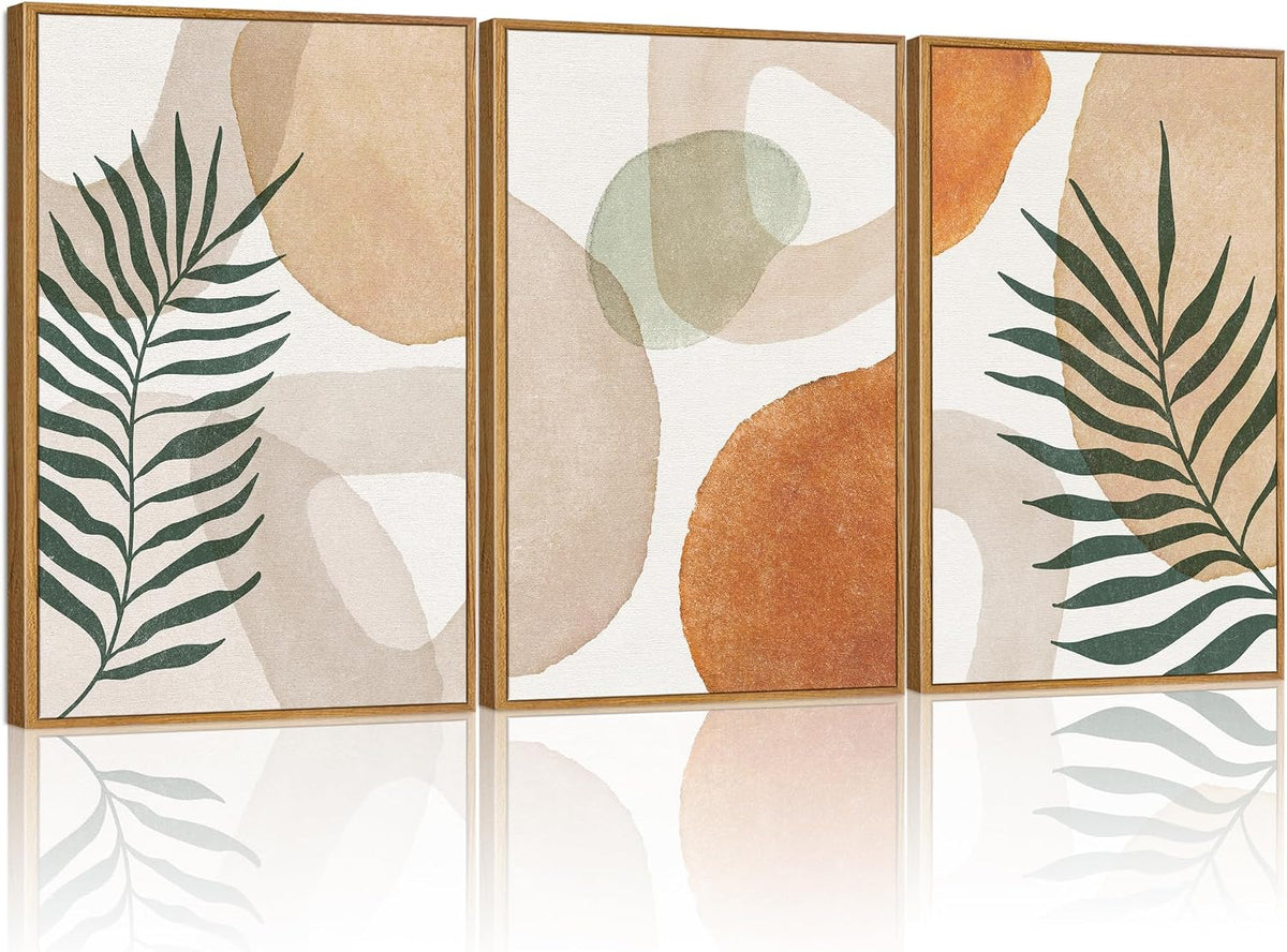 Triptych with thin wood frames showing overlapping neutral shapes, rust-orange circle and green palm-like leaves.
