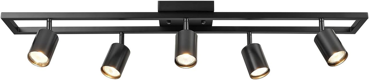 Black rectangular track with five adjustable cylindrical spot heads illuminated.
