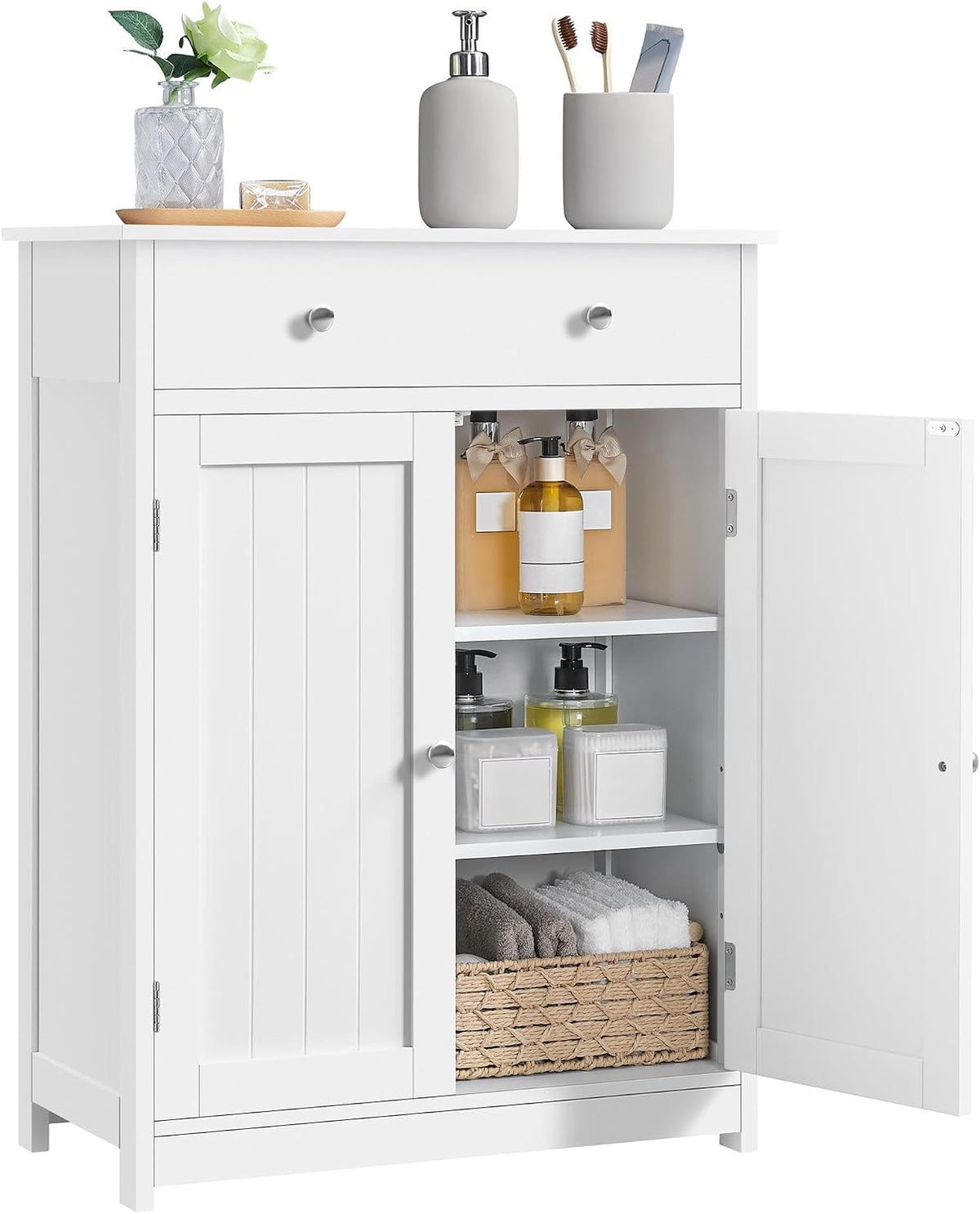 White cabinet with single top drawer and right door open revealing two interior shelves and a woven basket.