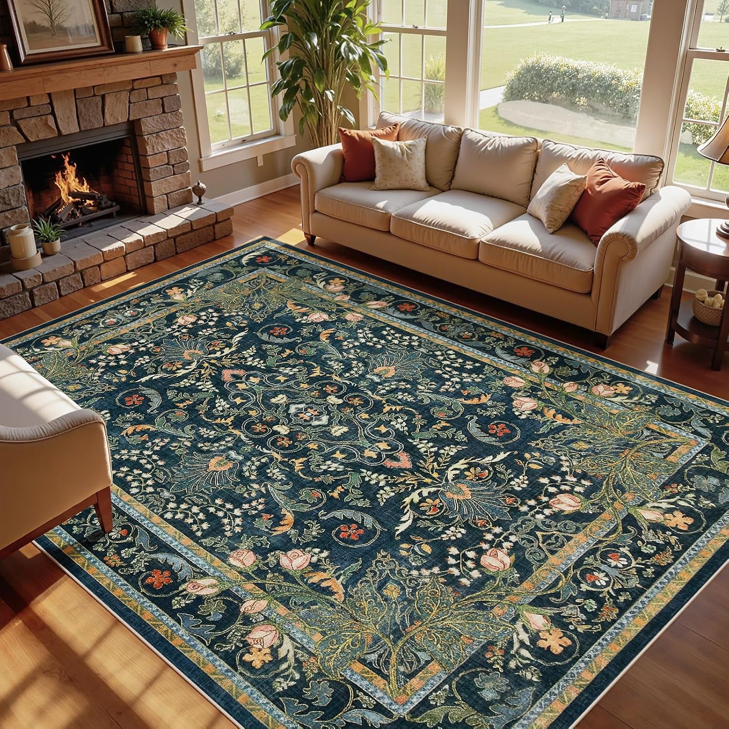 Teal ornamental rug filling a sunny living room with a cream sofa and large windows