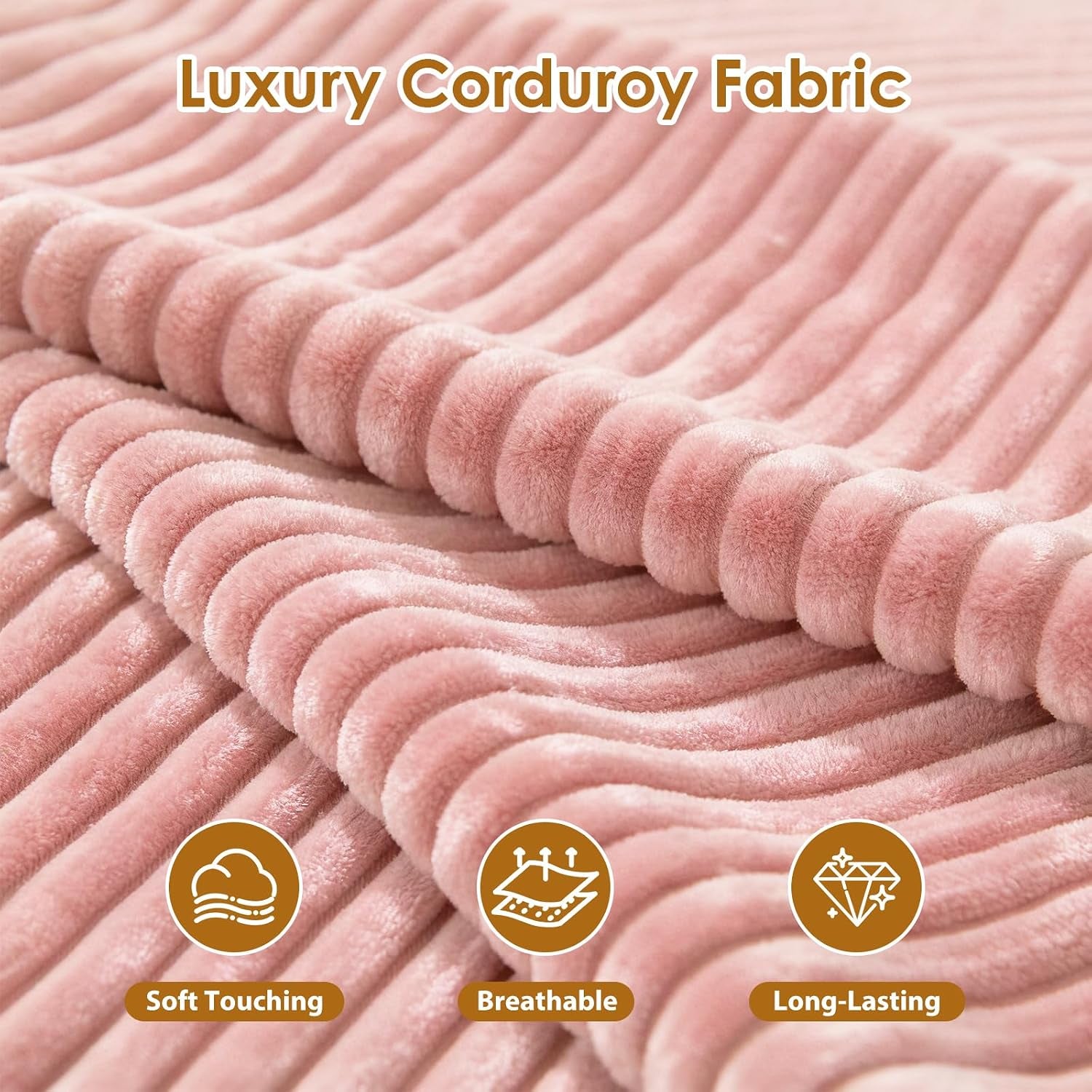 Close-up of plush ribbed corduroy fabric in a soft pink shade folded to show texture.