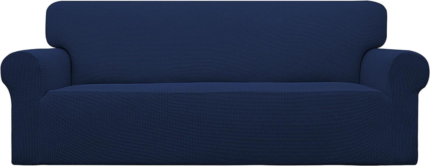 Panoramic straight-on view of a navy slipcover fitted smoothly over a two-cushion loveseat.