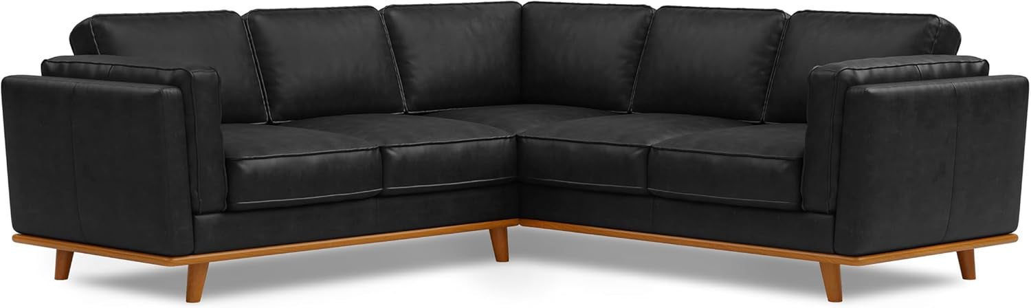 Black L-shaped corner leather sofa shown at an angle, wooden base and tapered legs.