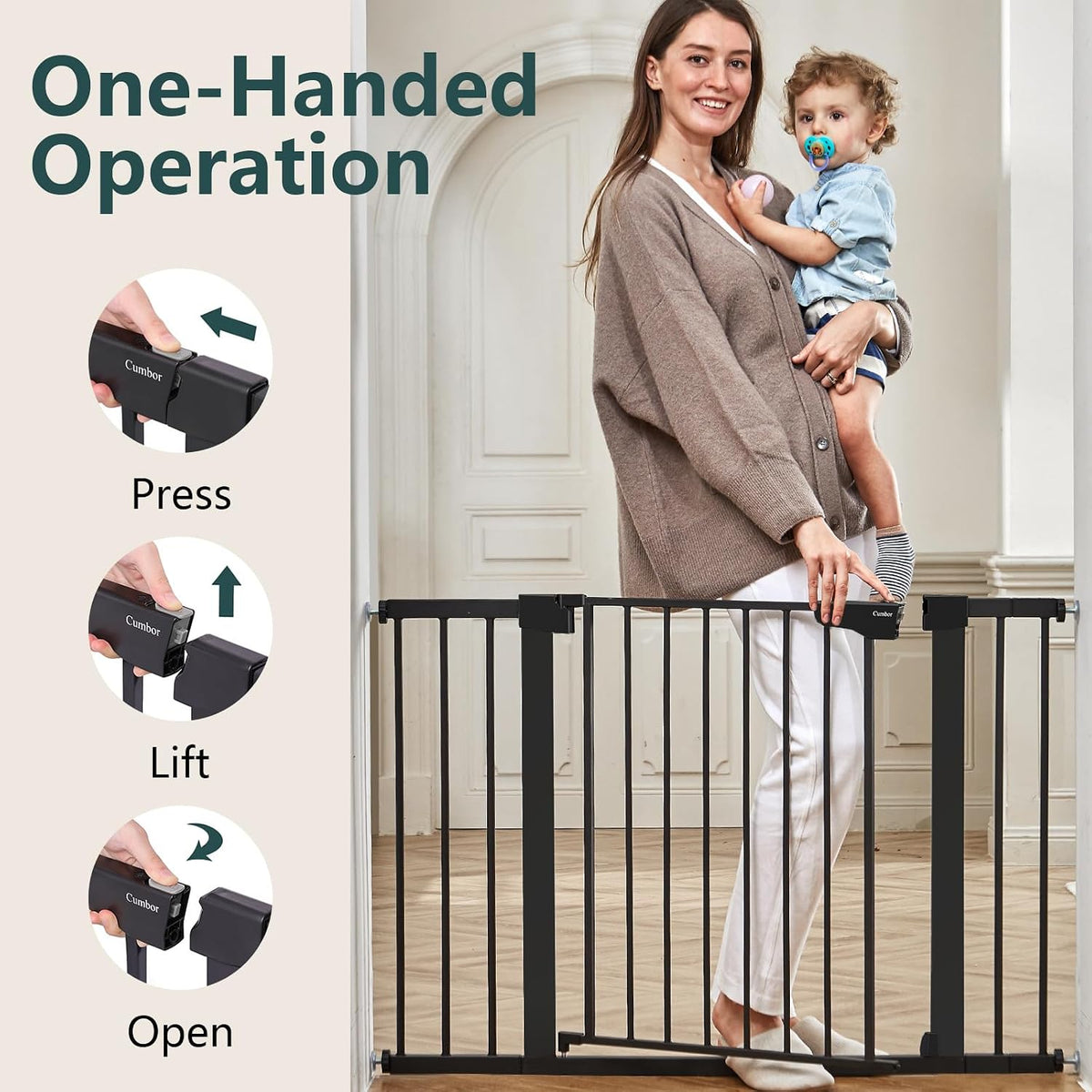Woman holding a toddler opens a black metal gate using the latch with one hand